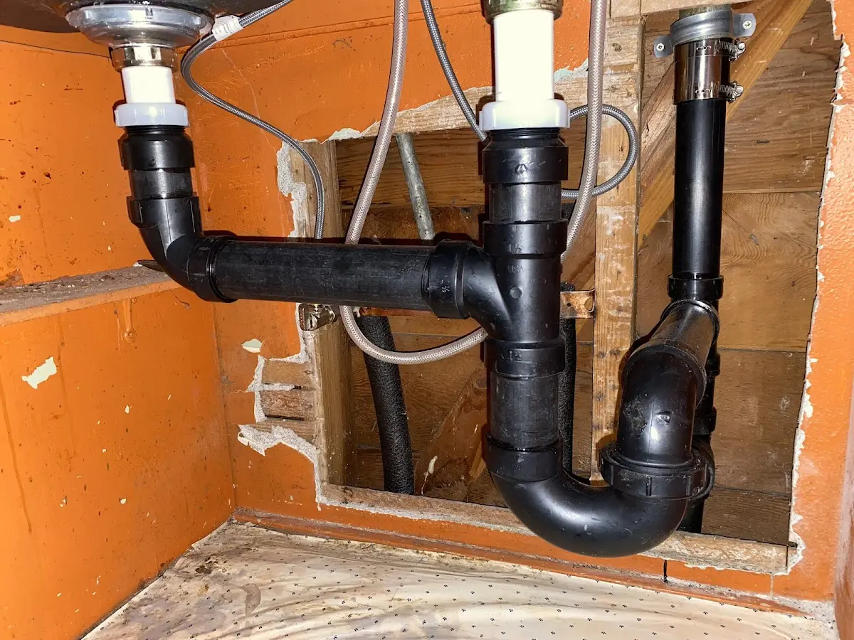 Professional Garbage Disposal Repair equipment and tools on the job in Sugarloaf